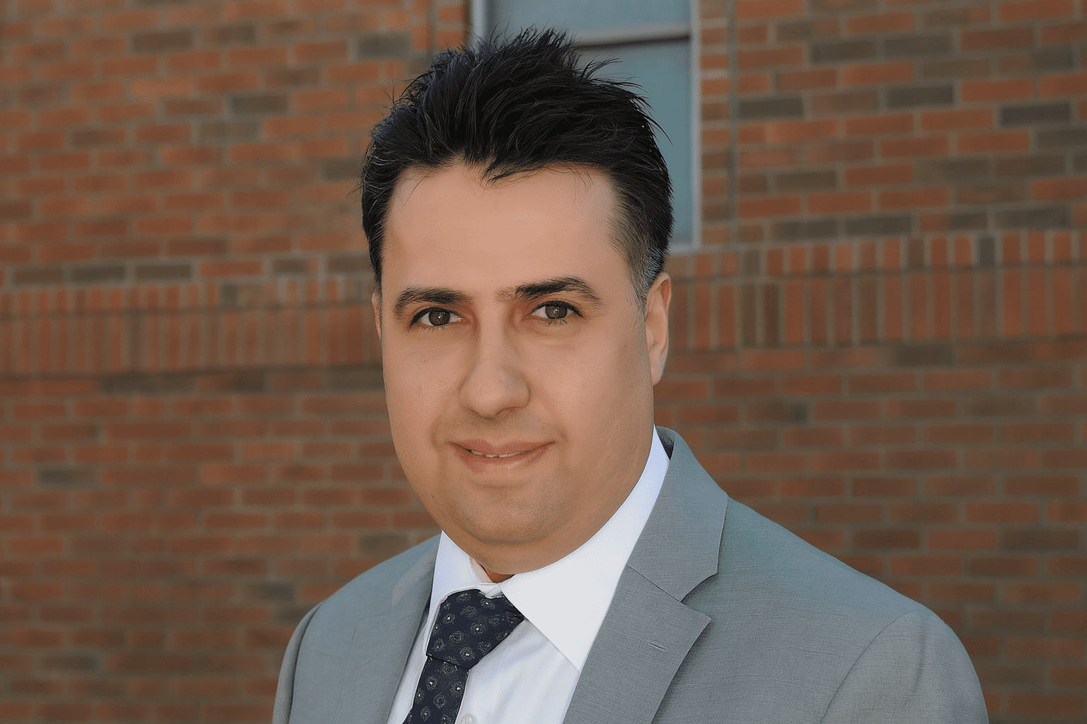 Dr. Basel Alhaddad, MD